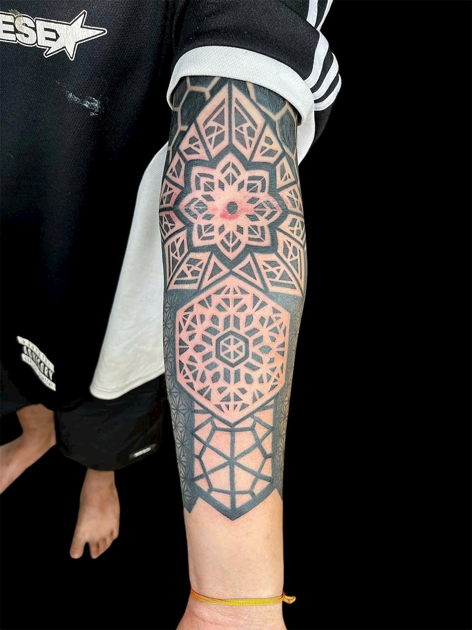 Mandala geometric forearm tattoo — Rae Ink Saigon