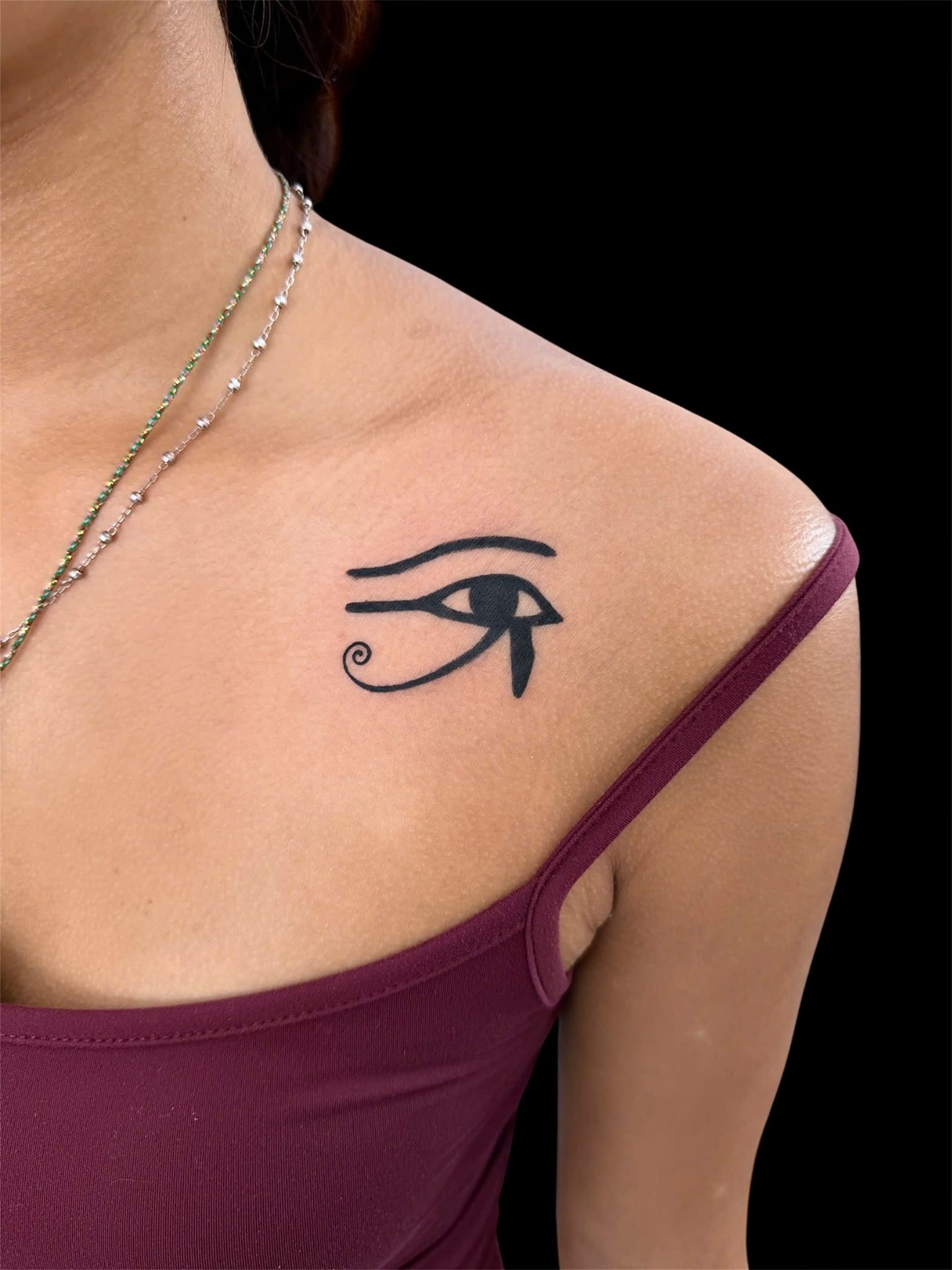 Eye of Horus collarbone fine line tattoo — Rae Ink Ho Chi Minh