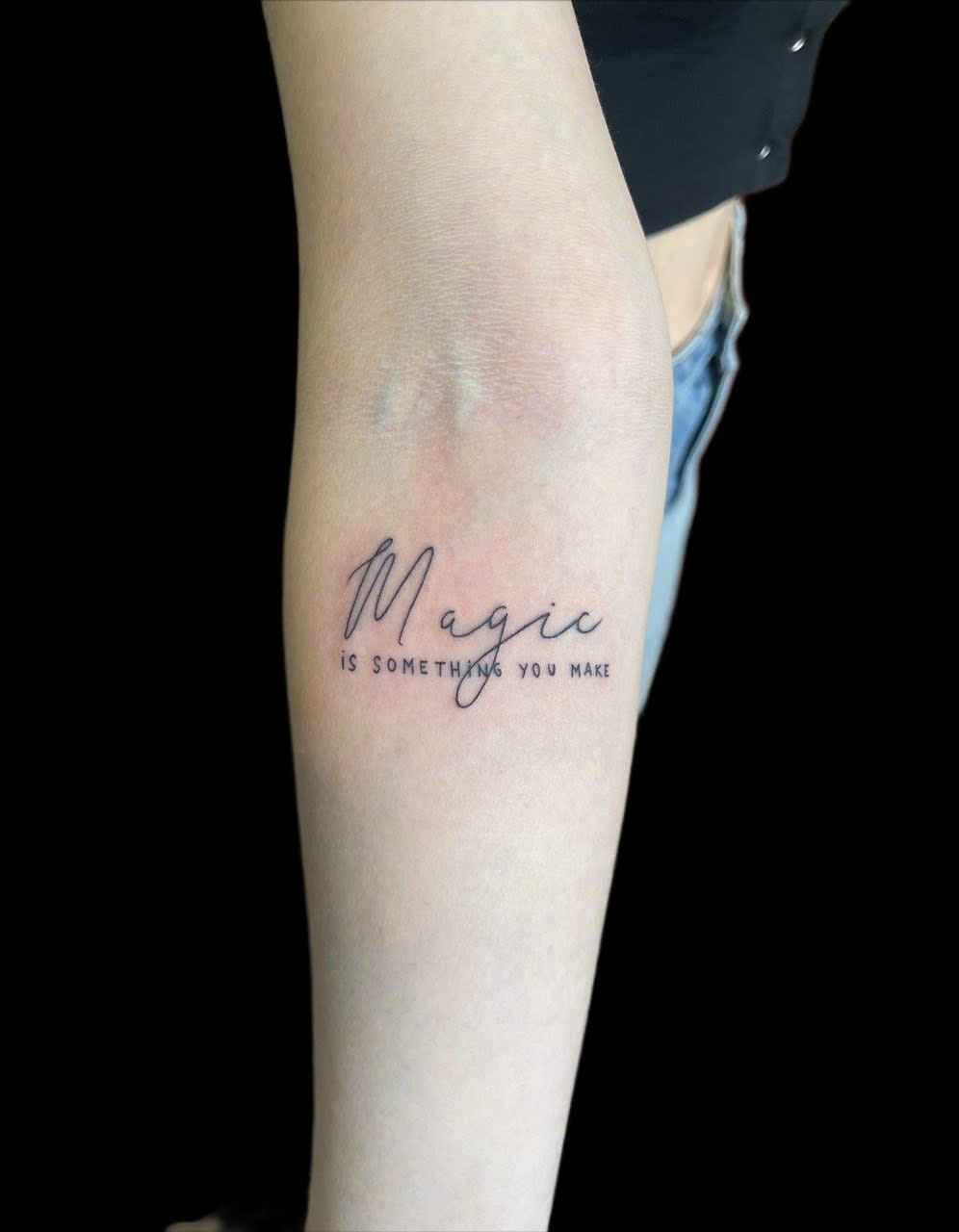 Fine line script forearm tattoo — Rae Ink Ho Chi Minh